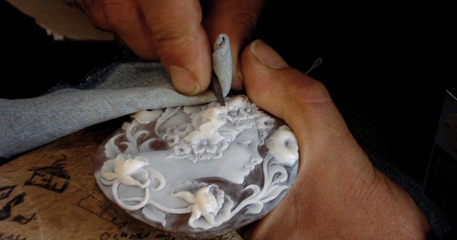 Florentine artisan working in a traditional workshop, preserving ancient crafting techniques